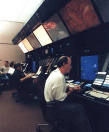 An air traffic controller using a display system at an Air Route Traffic Control Center An air traffic controller using a display system at an Air Route Traffic Control Center