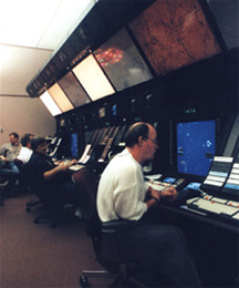 An air traffic controller using a display system at an Air Route Traffic Control Center