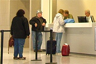 An airport ticket counter An airport ticket counter