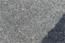 A close-up view of a chipseal road surface A close-up view of a chipseal road surface