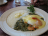 Eggs Sardou at Lucile's: poached eggs, creamed spinach, gulf shrimp, grits Eggs Sardou at Lucile's: poached eggs, creamed spinach, gulf shrimp, grits