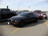 A Mustang GT illegally occupying two parking spaces at Vaughan Mills Mall, Ontario A Mustang GT illegally occupying two parking spaces at Vaughan Mills Mall, Ontario