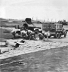 Soldiers of IX Engineering Command, U.S. Army Air Force, putting down a Pierced Steel Planking (PSP) Runway at an Advanced Landing Ground under construction somewhere in France following the Normandy Landings of World War II Soldiers of IX Engineering Command, U.S. Army Air Force, putting down a Pierced Steel Planking (PSP) Runway at an Advanced Landing Ground under construction somewhere in France following the Normandy Landings of World War II