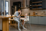 Mother feeding a child breakfast Mother feeding a child breakfast
