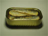 A can of sardines — what many of us feel like on board a modern airliner A can of sardines — what many of us feel like on board a modern airliner