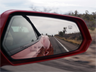 The side mirror view from an automobile The side mirror view from an automobile