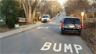 Speed bump and warning signs in Bloomington, Indiana, USA Speed bump and warning signs in Bloomington, Indiana, USA