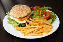 A cheeseburger with fries