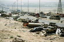 Demolished vehicles line Highway 80, also known as the "Highway of Death" Demolished vehicles line Highway 80, also known as the "Highway of Death"