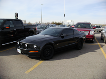 A Mustang GT illegally occupying two parking spaces at Vaughan Mills Mall, Ontario A Mustang GT illegally occupying two parking spaces at Vaughan Mills Mall, Ontario