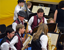 A band of mostly saxophones A band of mostly saxophones