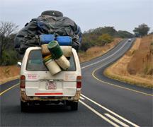 An overloaded transport bus