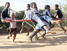 Six kids on a PlayPump Six kids on a PlayPump
