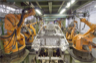 Industrial robots assembling automobiles Industrial robots assembling automobiles